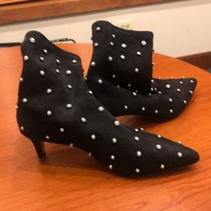 Pearl encrusted boots.